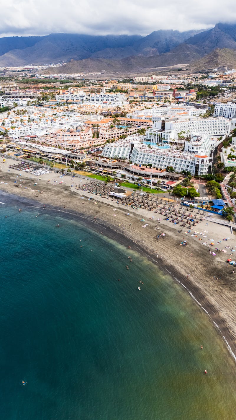 Aerial view of resort pool and beach in Tenerife